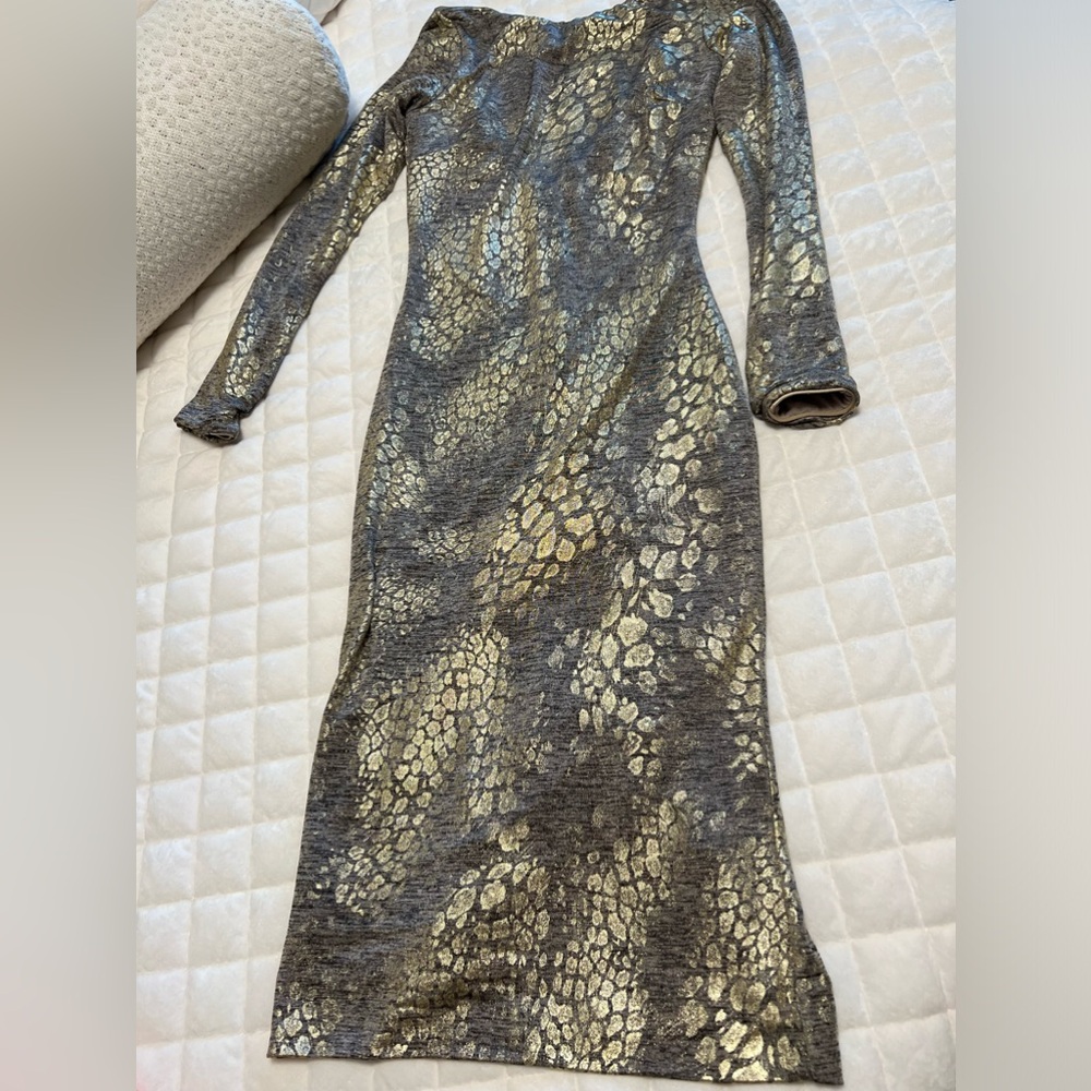 Dress the Population. Gold and black animal print. Classy and elegant.